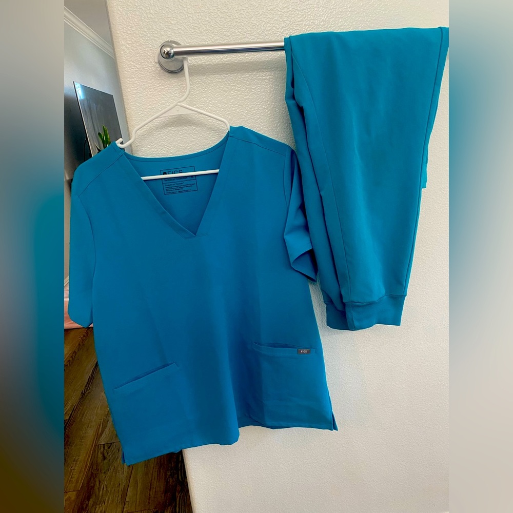 FIG scrub sets x 2. Please see this price is for each not both !